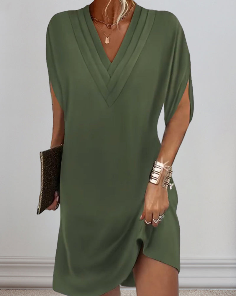 María – Elegantes Kleid mit schlichten Schlitzärmeln