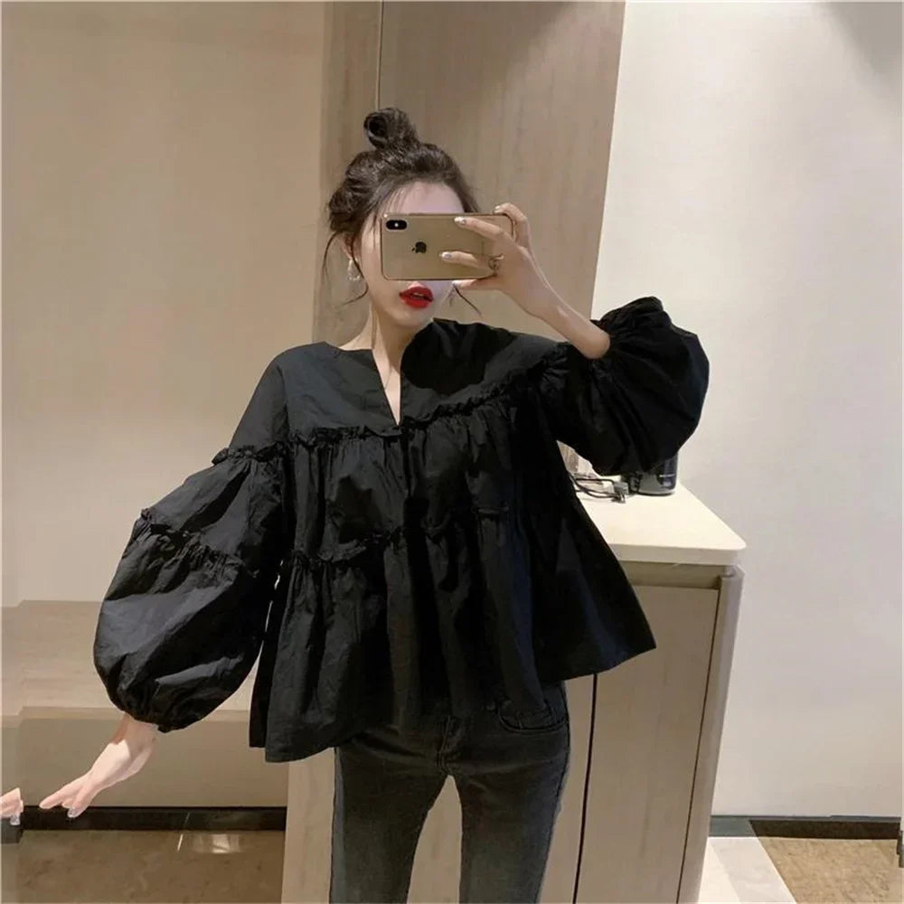 Babydoll-Bluse mit Ballonärmeln und einfarbigem V-Ausschnitt