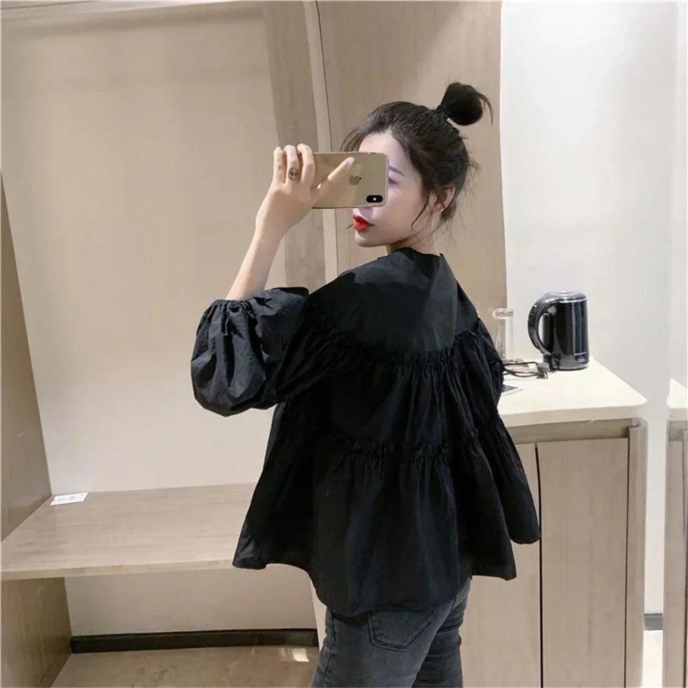 Babydoll-Bluse mit Ballonärmeln und einfarbigem V-Ausschnitt