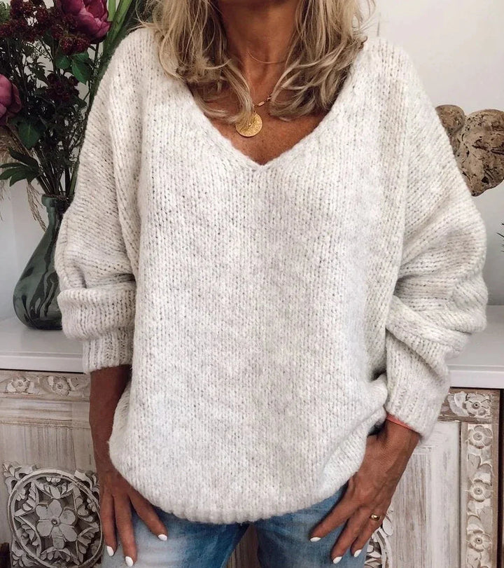 Langärmeliger lakonischer Pullover