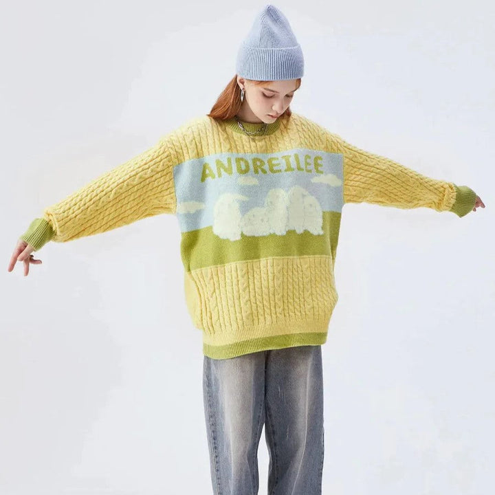 Odessa - Zopfmusterpullover mit pastellfarbenem Wolkenmotiv