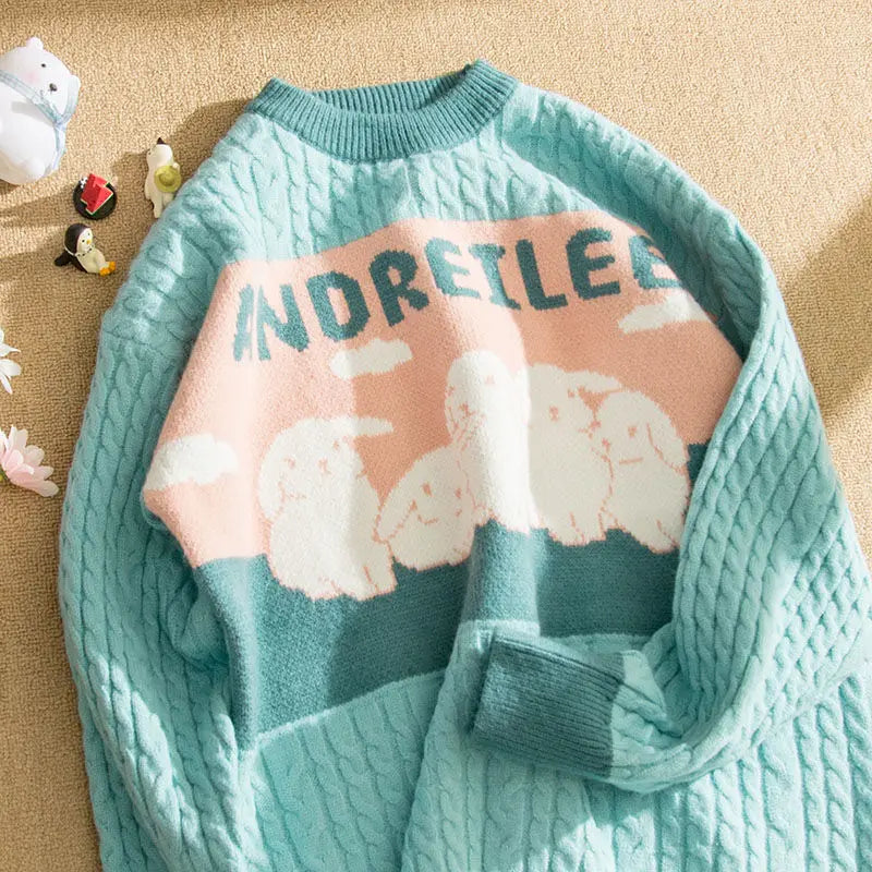 Odessa - Zopfmusterpullover mit pastellfarbenem Wolkenmotiv
