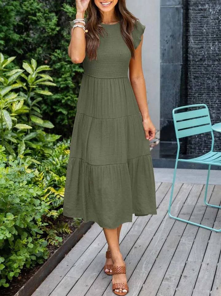 Raffiniertes bauchbedeckendes Kleid