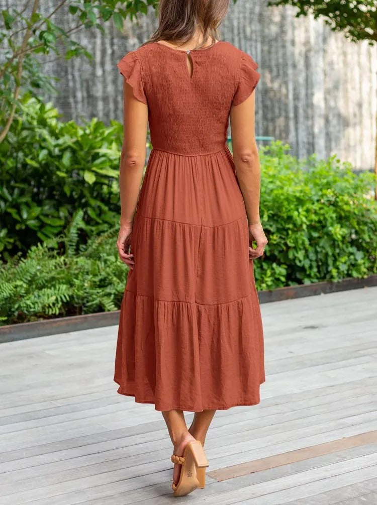 Raffiniertes bauchbedeckendes Kleid
