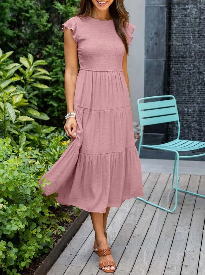 Raffiniertes bauchbedeckendes Kleid