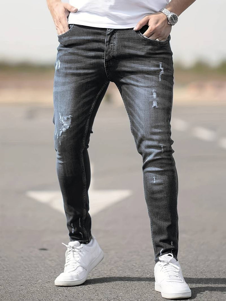 Herrenjeans Skinny-Jeans Fit mit Destroyed-Optik