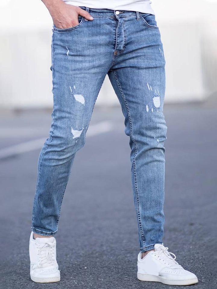Herrenjeans Skinny-Jeans Fit mit Destroyed-Optik