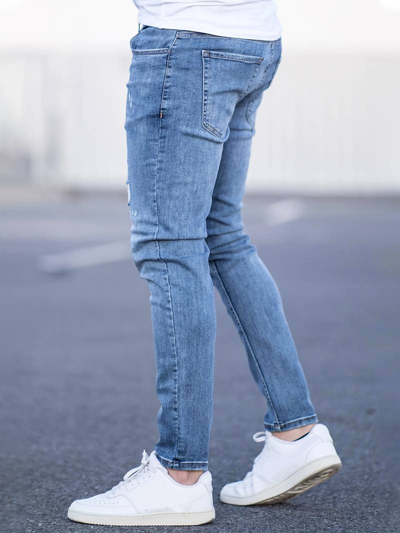 Herrenjeans Skinny-Jeans Fit mit Destroyed-Optik
