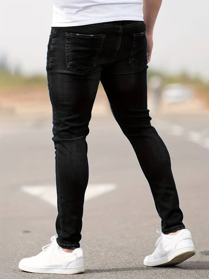 Herrenjeans Skinny-Jeans Fit mit Destroyed-Optik