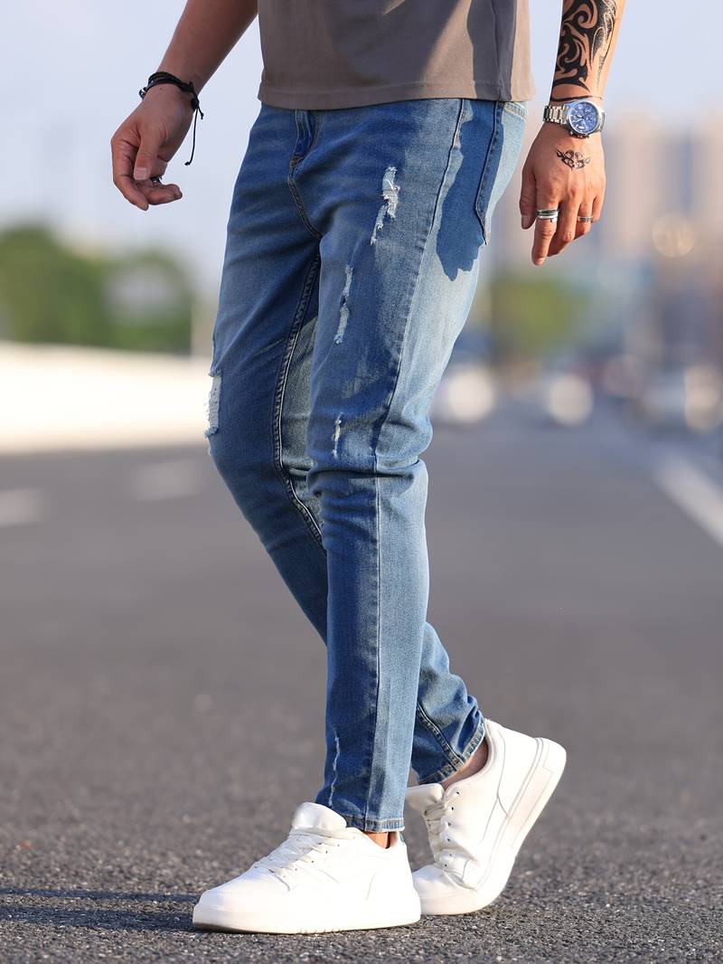 Herrenjeans Skinny-Jeans Fit mit Destroyed-Optik