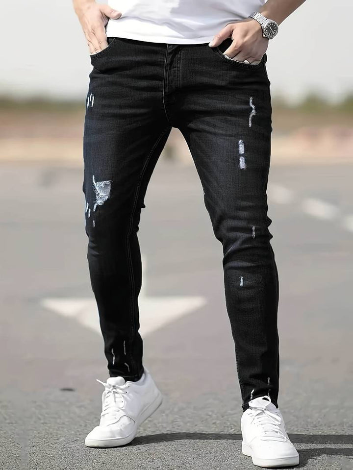 Herrenjeans Skinny-Jeans Fit mit Destroyed-Optik
