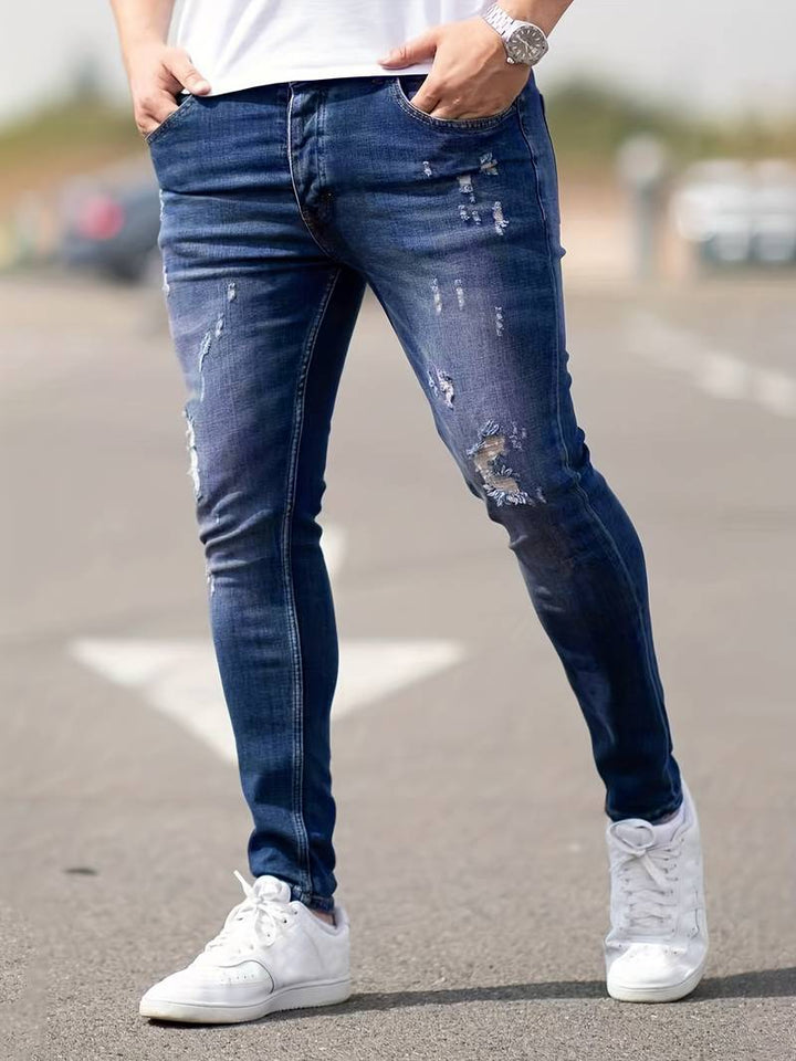 Herrenjeans Skinny-Jeans Fit mit Destroyed-Optik