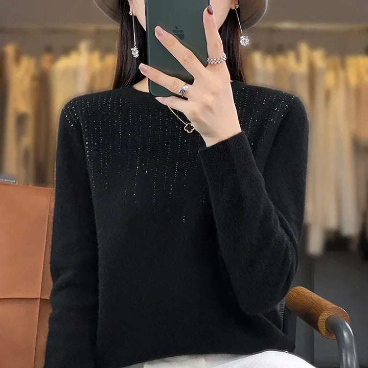 Warme glitzernde Strickjacke