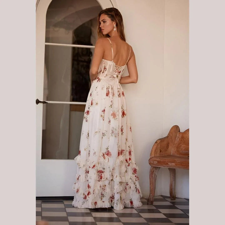 Damen Maxikleid mit Spaghettiträgern und V-Ausschnitt sowie Blumenmuster und Beinschlitz