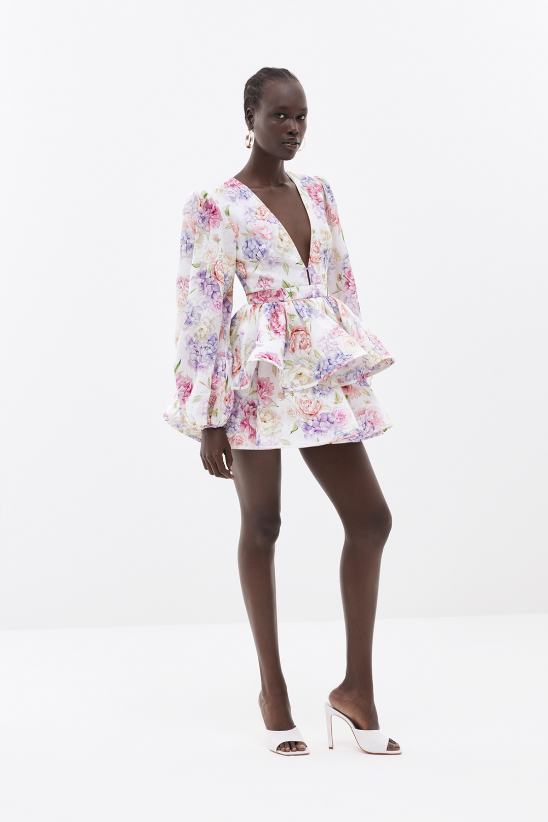 Damen Minikleid mit Blumenmuster tiefem V-Ausschnitt Ballonärmeln und Stufenrock