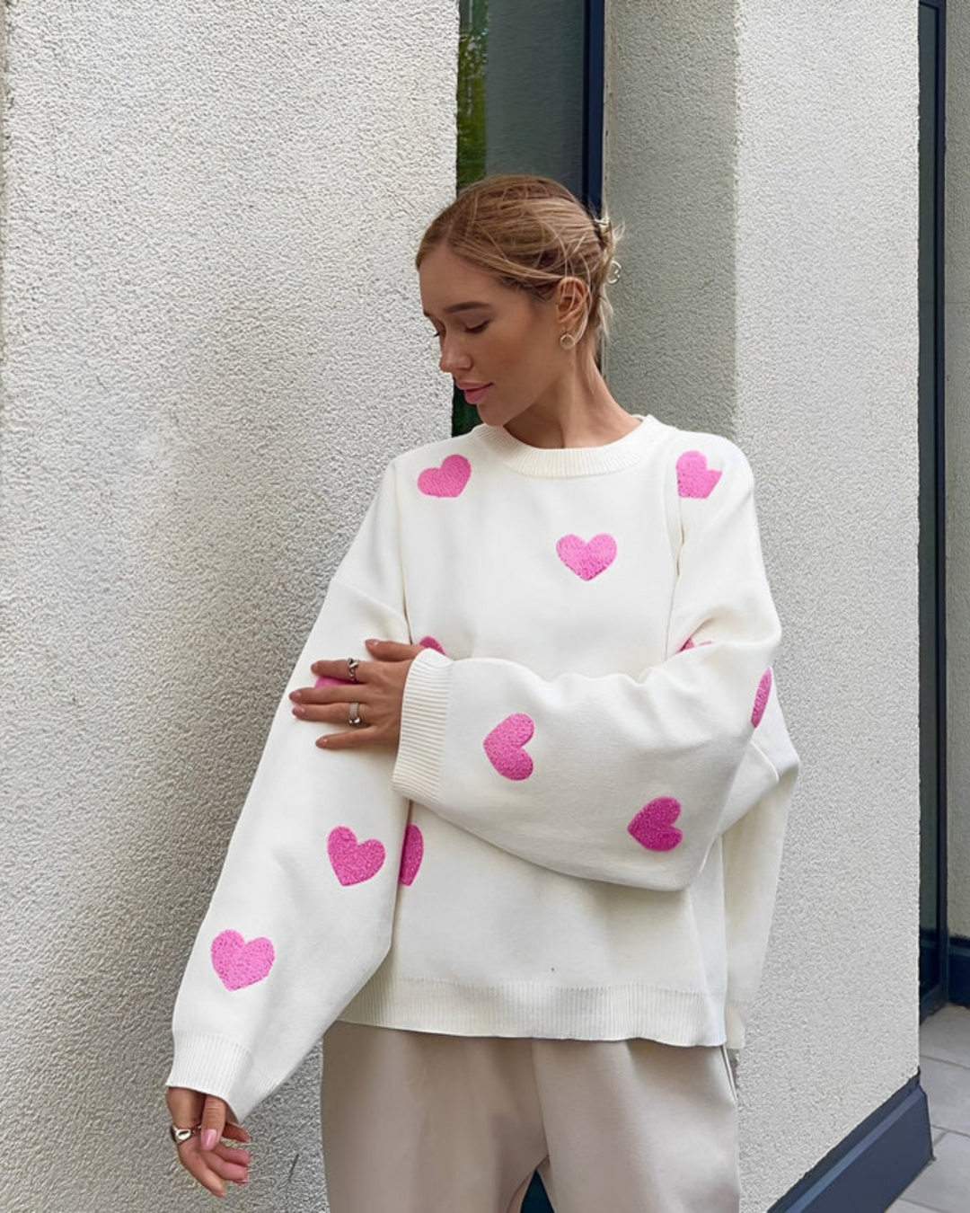 Damen Pullover mit Herz-Applikationen und Rundhalsausschnitt