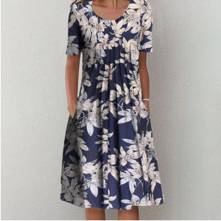 Lily – Stilvolles und lässiges Damenkleid mit floralem Muster und Taschen